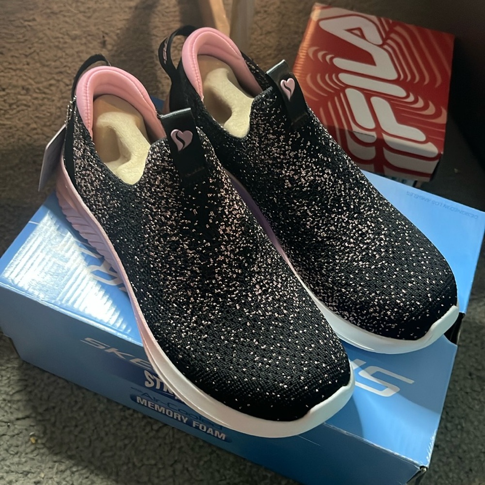 Skechers. Black with pink soles and speckles.